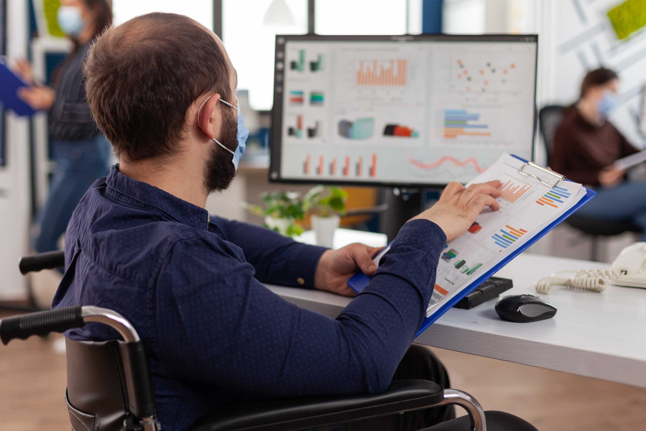 handicapped-businessman-wearing-medical-face-mask-2026-01-05-00-18-15-utc